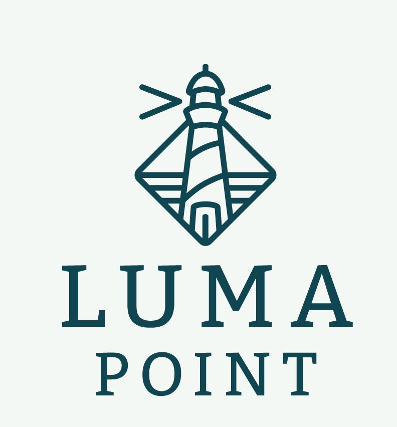 A logo with a lighthouse and the words "LUMA POINT" below it.